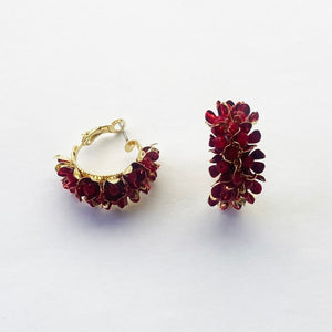 Image shows Rich Burgundy Erica Drop Earrings against a grey background.