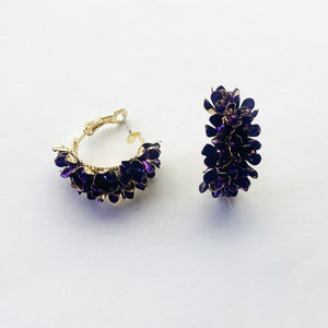Image shows Rich Plum Erica Drop Earrings against a grey background.