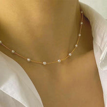 Load image into Gallery viewer, Image shows Gretel Pearl Choker on a model&#39;s neck.
