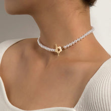 Load image into Gallery viewer, Image shows gold-finish Justine Choker on a model.
