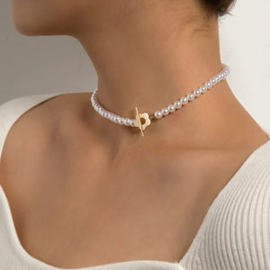 Image shows gold-finish Justine Choker on a model.