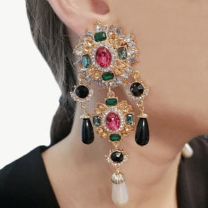 Image shows Lydia Statement Earrings on a model.
