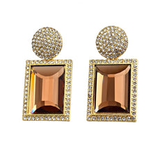 Load image into Gallery viewer, Image shows brown and gold Margot Statement Earrings on a white background.
