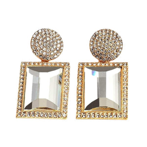 Image shows gold Margot Statement Earrings on a white background.