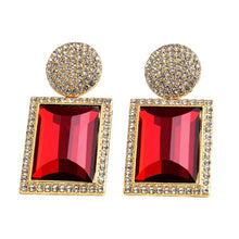 Load image into Gallery viewer, Image shows red and gold Margot Statement Earrings on a white background.
