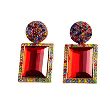 Load image into Gallery viewer, Image shows red rainbow Margot Statement Earrings on a white background.

