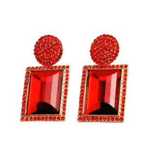 Image shows red Margot Statement Earrings on a white background.