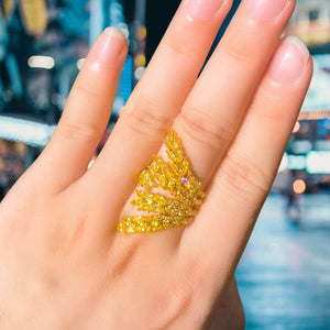 Image shows Miriam Starburst Ring on model's finger.