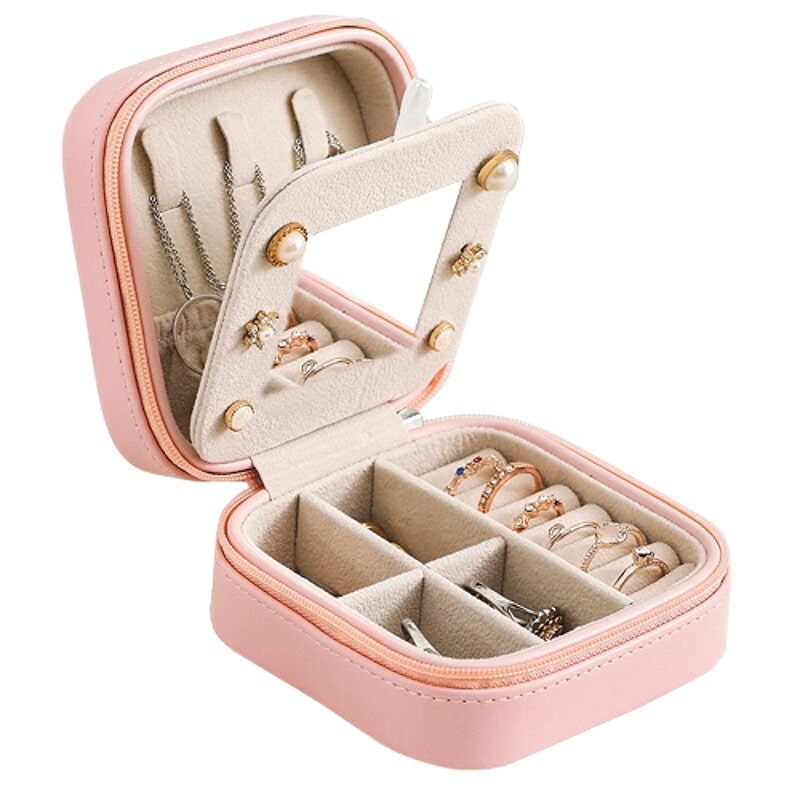 Image shows Rose Pink Piccolino Jewellery Case against white background.