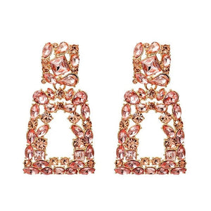 Image shows Pink Sparkle Jenny Drop Earrings product photo on white background.