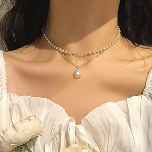 Image shows Princess Pearl Necklace on model.
