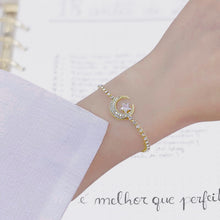 Load image into Gallery viewer, Image shows Selene Slider Bracelet on a model&#39;s wrist.
